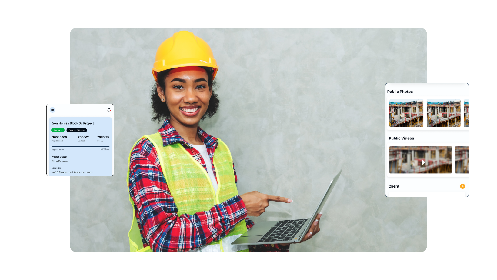 A happy construction lady pointing a computer